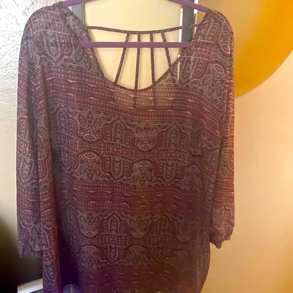 Blouse a little sheer . Very pretty on.